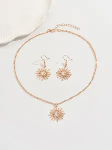 Gold-tone sun moon pendant necklace and earrings jewelry set, stylish everyday accessory for women.