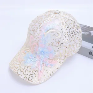 Detailed view of women's sequin lace baseball cap with embroidered flower and pearl details.