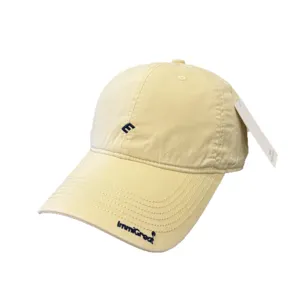 Casual yellow cotton baseball cap with blue embroidery, soft top sun hat for women and men.
