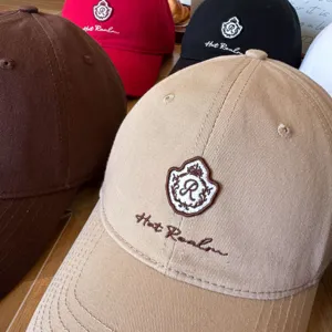 Classic embroidered baseball cap, cotton casual dad hat with stylish custom logo design.