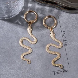 Gold metal snake shoe charms, punk style boot accessories and unique Halloween jewelry details.