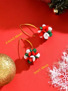 Close-up detail of Christmas acrylic beaded flower drop earrings in red, white and green.