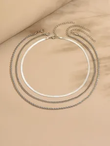 Set di collane a strati color argento da donna, con catena a spina di pesce e corda.