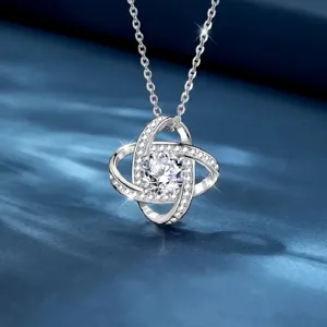 Elegant silver interlocking zircon pendant necklace main product display with sparkling stones.