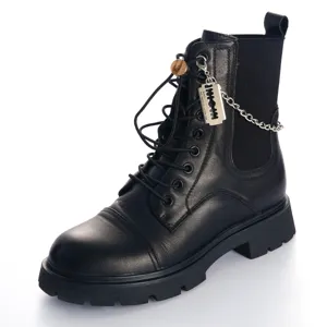 Black leather combat boots with lace-up design, elastic sides, and metal chain razor blade pendant.