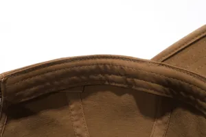 Close up view showing fine inner stitching and premium fabric construction of the baseball cap.
