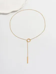 Minimalist gold stainless steel circle and bar pendant lariat necklace detail shot.