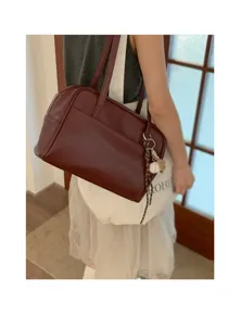 Retro dark red leather shoulder underarm bag detail, large capacity casual daily fashion style.
