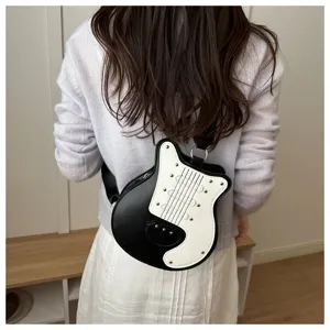 Unique guitar shaped crossbody bag, stylish black and white shoulder bag with rivets.