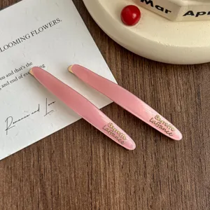 Pink acetate hair clips for women, elegant side barrettes with gold letter decor daily use.