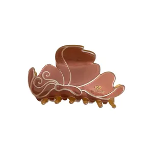 French minimalist flower hair claw clip, elegant brown resin hair accessory for women main view