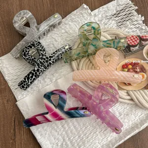 Korean acetate hair claw clip, large shark clip for thick hair, elegant hair styling accessory.