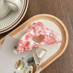 Korean minimalist acetate hair claw clip for women, stylish heart cutout shark hair styling accessory.