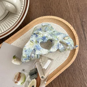 Korean minimalist blue acetate hair claw clip, elegant marbled shark clip for women styling.
