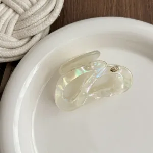Pearlescent irregular hair claw clip for women, elegant medium shark clip for daily styling.