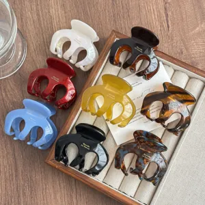 Medium acetate hair claw clip set, elegant pumpkin shape design, anti-slip hair accessory.