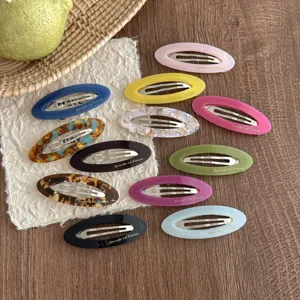 Korean oval acetate hair clips set, colorful snap hair pins for daily styling.