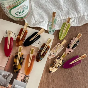 Chic acetate hair clips in various tortoise shell and solid colors, stylish side hair barrettes.