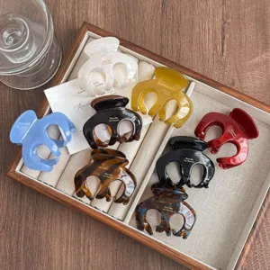 Cellulose acetate hair claw clip set, medium size pumpkin design, stylish hair accessories.