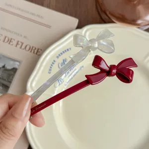 Korean acetate bow hair clip detail view, elegant hair accessory for women styling and buns.