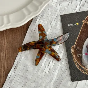 Detailed view of the stylish acetate starfish hair clip, beautiful side hairpin for women.