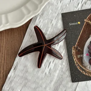 Chic brown cellulose acetate starfish hair clip, elegant side barrette for women and girls.