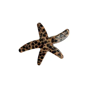 Leopard print acetate starfish hair clip for women, stylish side hairpin and hair accessory.
