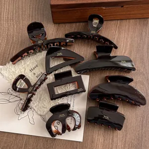 Dark brown acetate hair claw clips set, various chic geometric shapes for elegant hairstyles.