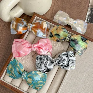French style acetate bow hair clip with sparkling rhinestones, elegant hair accessory.