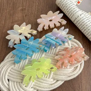 Close-up of colorful acetate flower hair claw clips with exquisite translucent textures.