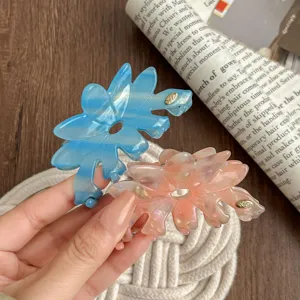 Large acetate flower hair claw clip, colorful translucent floral design for elegant daily updos.