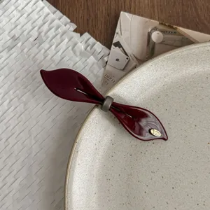 Elegant burgundy leaf spring hair clip, glossy finish with gold accent for sweet versatile daily styling.