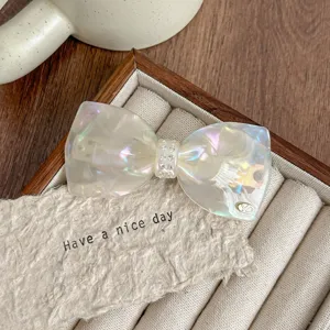 French style rhinestone bow hair clip acetate spring clip detail view high end hair accessory.