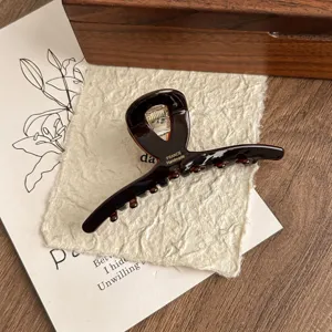 Brown acetate hair claw clip, elegant shark clip for women styling, daily hair accessories.
