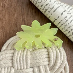 Large acetate flower hair claw clip, stylish yellow hair accessory for women and girls daily wear.