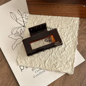 Brown acetate hair claw clip detail view geometric square shark clip daily styling