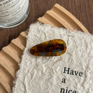 Sweet acetate teardrop hair clip for women, stylish tortoiseshell design for daily hair styling.