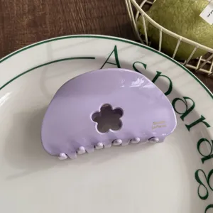Purple hair claw clip with flower cutout, aesthetic acetate shark clip for women.