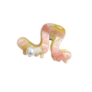 Stylish acetate hair claw clip with pearl, elegant wavy small hair accessory for women.