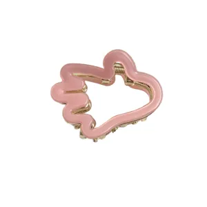 Jolie pince à cheveux en métal rose pour enfants, mini griffe élégante pour frange et coiffure mignonne.