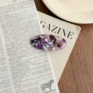 Acetate oval hair clip for women, stylish side hairpin and bang clip for elegant daily hairstyles.