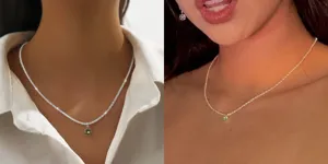 Gedetailleerd overzicht van de schitterende zilveren ketting met groene edelsteen hanger voor dames.