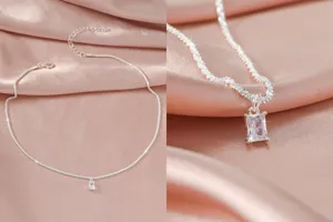 Elegante zilveren sleutelbeenketting met een sprankelende rechthoekige hanger.