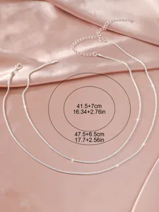 Dubbellaagse glinsterende zilveren choker halsketting, elegante minimalistische dames mode.