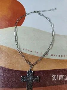 Silver-tone paperclip chain necklace featuring a textured metal cross pendant for women.