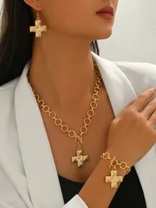 Gold cross pendant necklace earrings bracelet jewelry set for women fashion accessories detail view