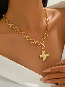 Gold alloy cross pendant necklace with OT toggle clasp, trendy minimalist style jewelry for women.