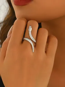 Close-up view of the silver snake open ring showing intricate scale texture and wrap design.