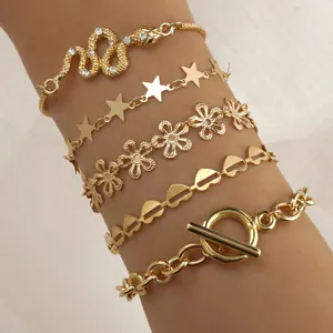 Gold-plated multi-layer bracelet set featuring snake star flower heart chain designs.