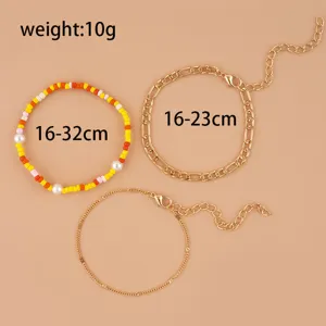 3-piece women's fashion bracelet set with colorful beaded pearl and delicate chains.